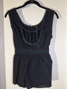 Sleeveless Black Top with Lace-Trim and Button Front